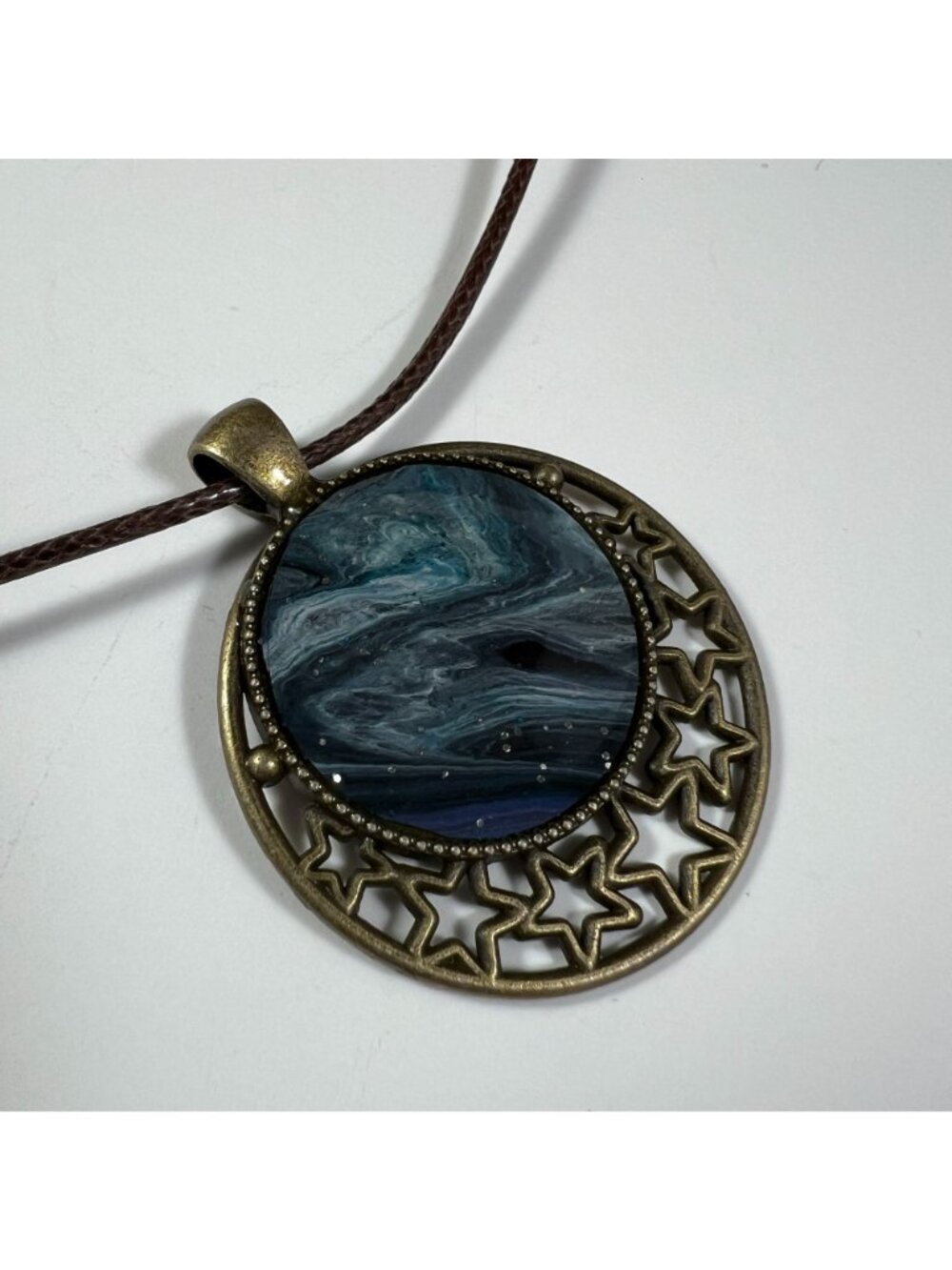 Starry Bronze Pendant With Blue Acrylic Pour Design Necklace - Picture 3 of 3